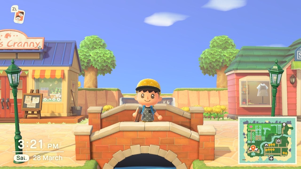 Изображение на персонаж, стоящ на мост в оформление на остров Таун в Animal Crossing New Horizons