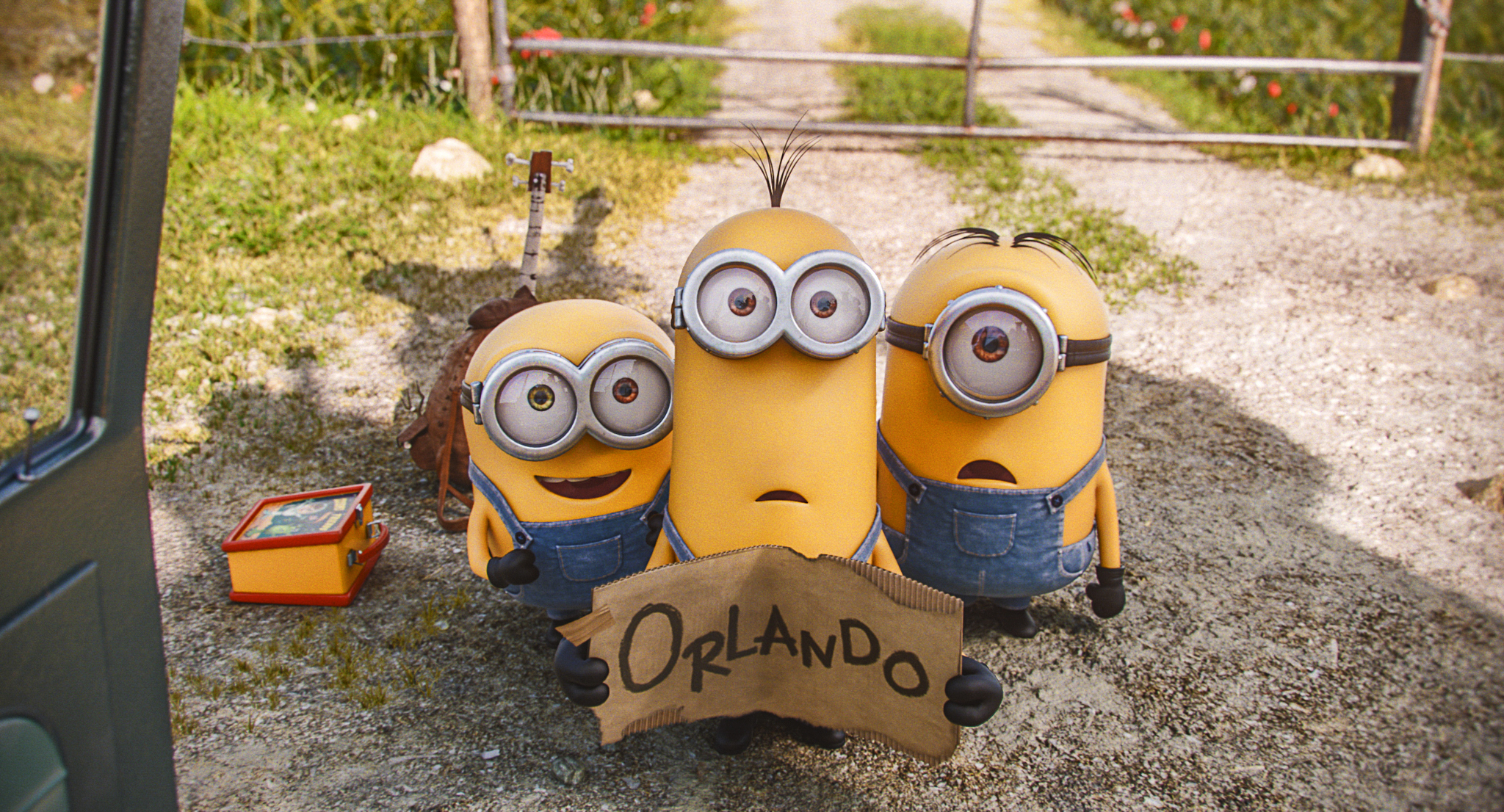 Minions tenant un panneau Orlando en 2015