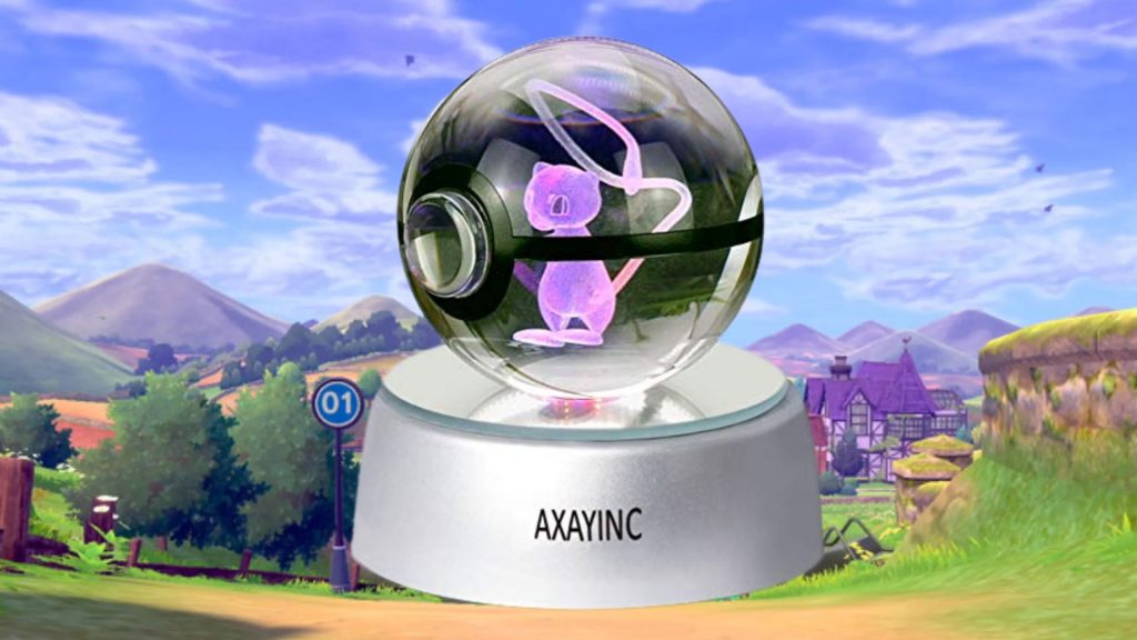3D Crystal Ball Toy di depan latar belakang Pokemon