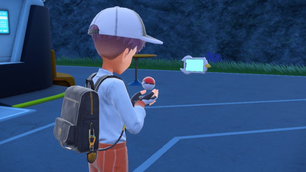Um treinador usando códigos comerciais para trocar Pokemon