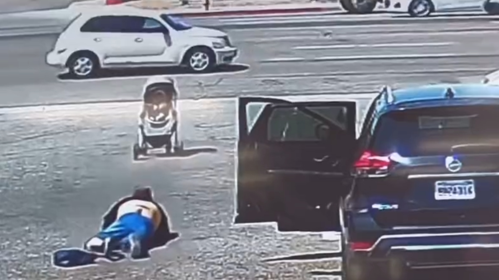 Viral hero saves baby in stroller from rolling into traffic after mom ...