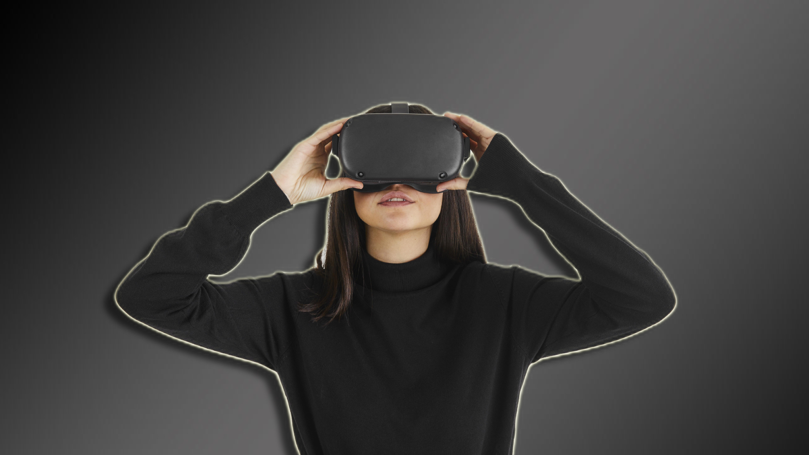 Eine Frau, die ein VR -Headset auf einem dunklen Bacground trägt